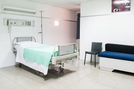 Photo shows an empty hospital bed, but not, like, in a sad way.