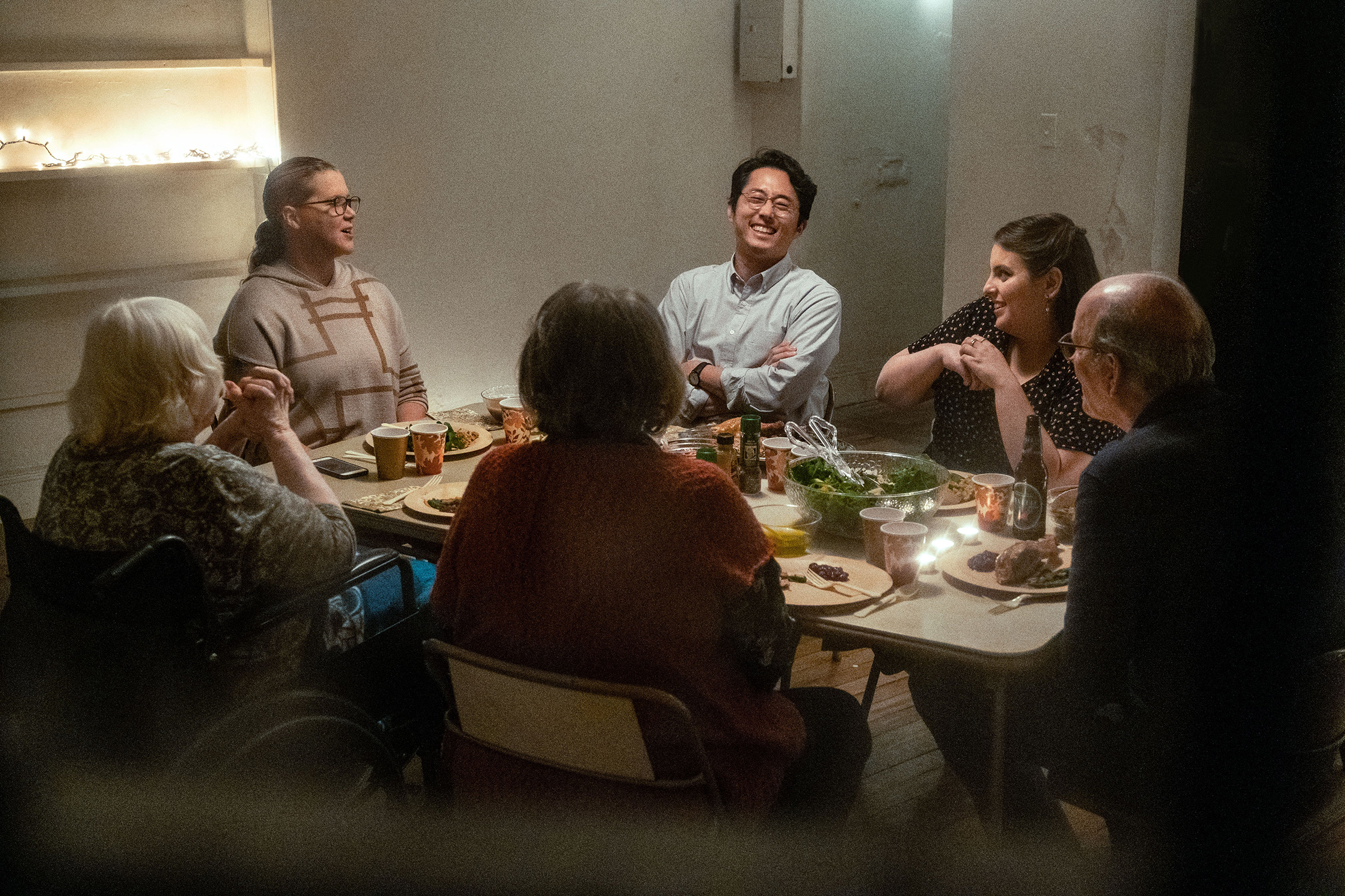 A family around the Thanksgiving dinner table in the new A24 film "The Humans"