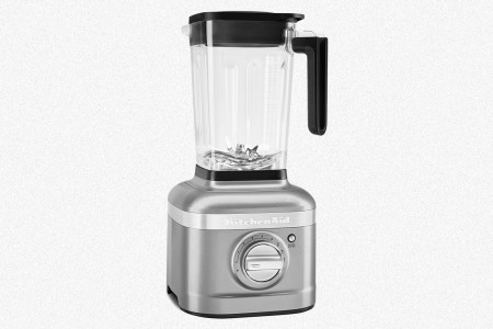 The KitchenAid K400 Variable Speed Blender in silver on a grey background