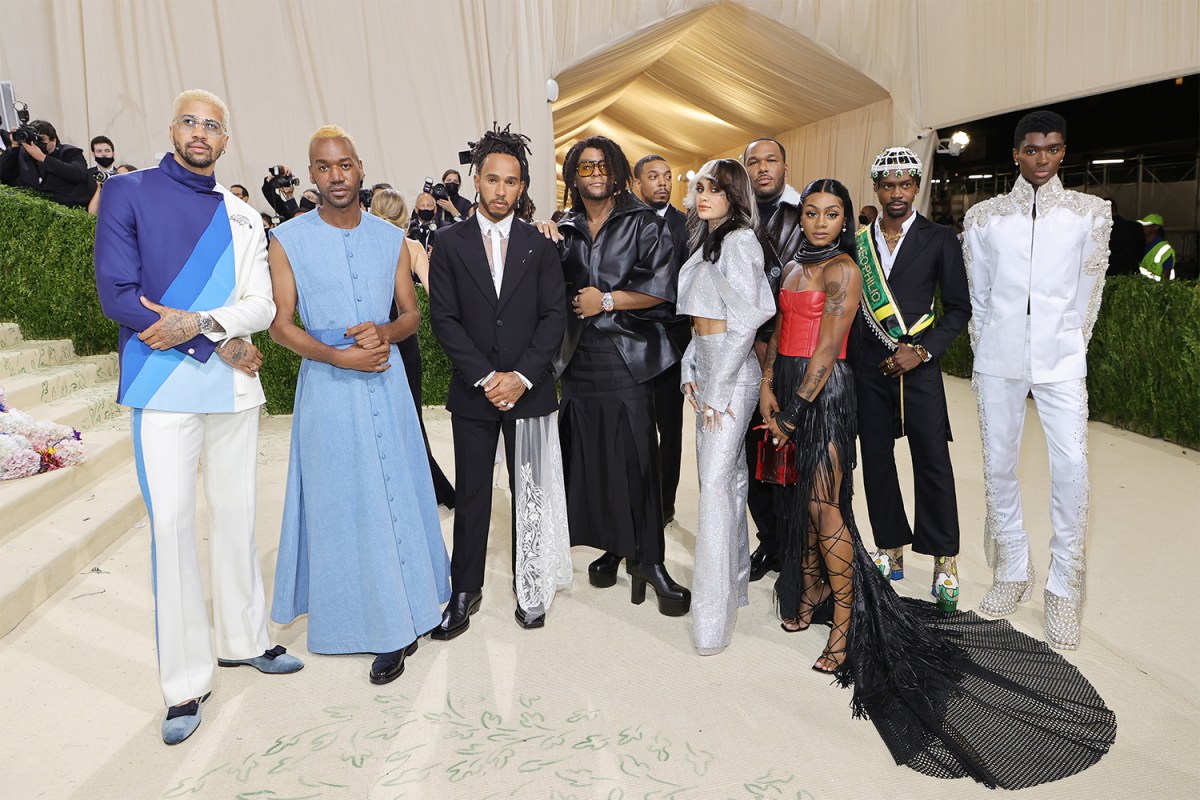 Lewis Hamilton, third from left in a black suit with white lace, and those he invited to the 2021 Met Gala, including Black fashion designers, creatives and athletes