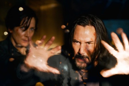 Carrie-Anne Moss and Keanu Reeves in a scene from "The Matrix Resurrections." The trailer for the sequel just launched.
