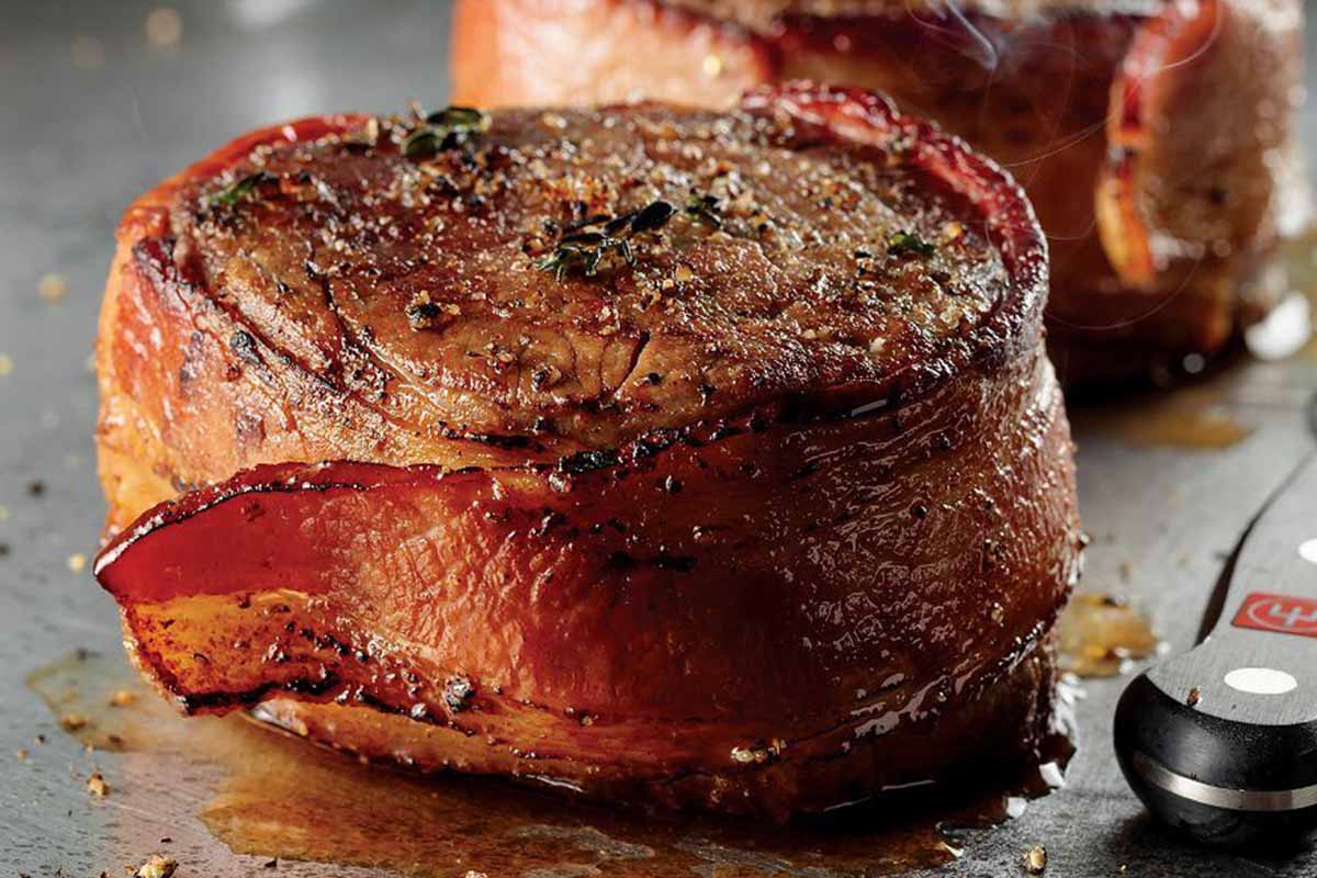 bacon-wrapped filet mignon from Omaha Steaks, now part of 50% off bundles