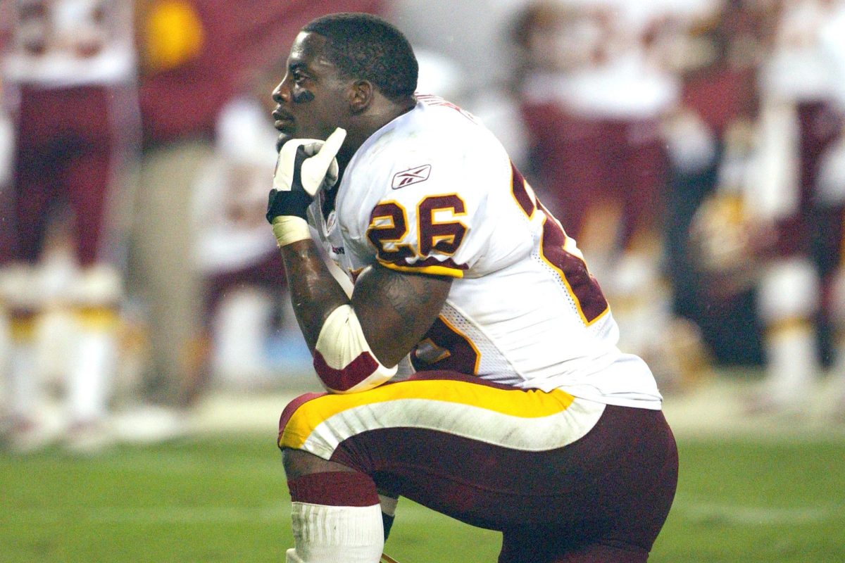 Clinton Portis looks on during an NFL football game in 2004
