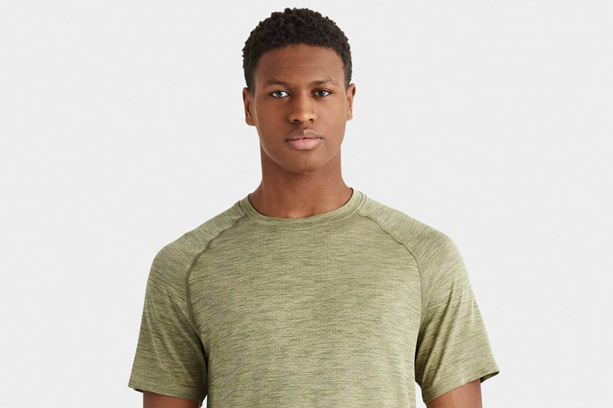 man in a green Reign Tech Shirt from Rhone, now 25% off