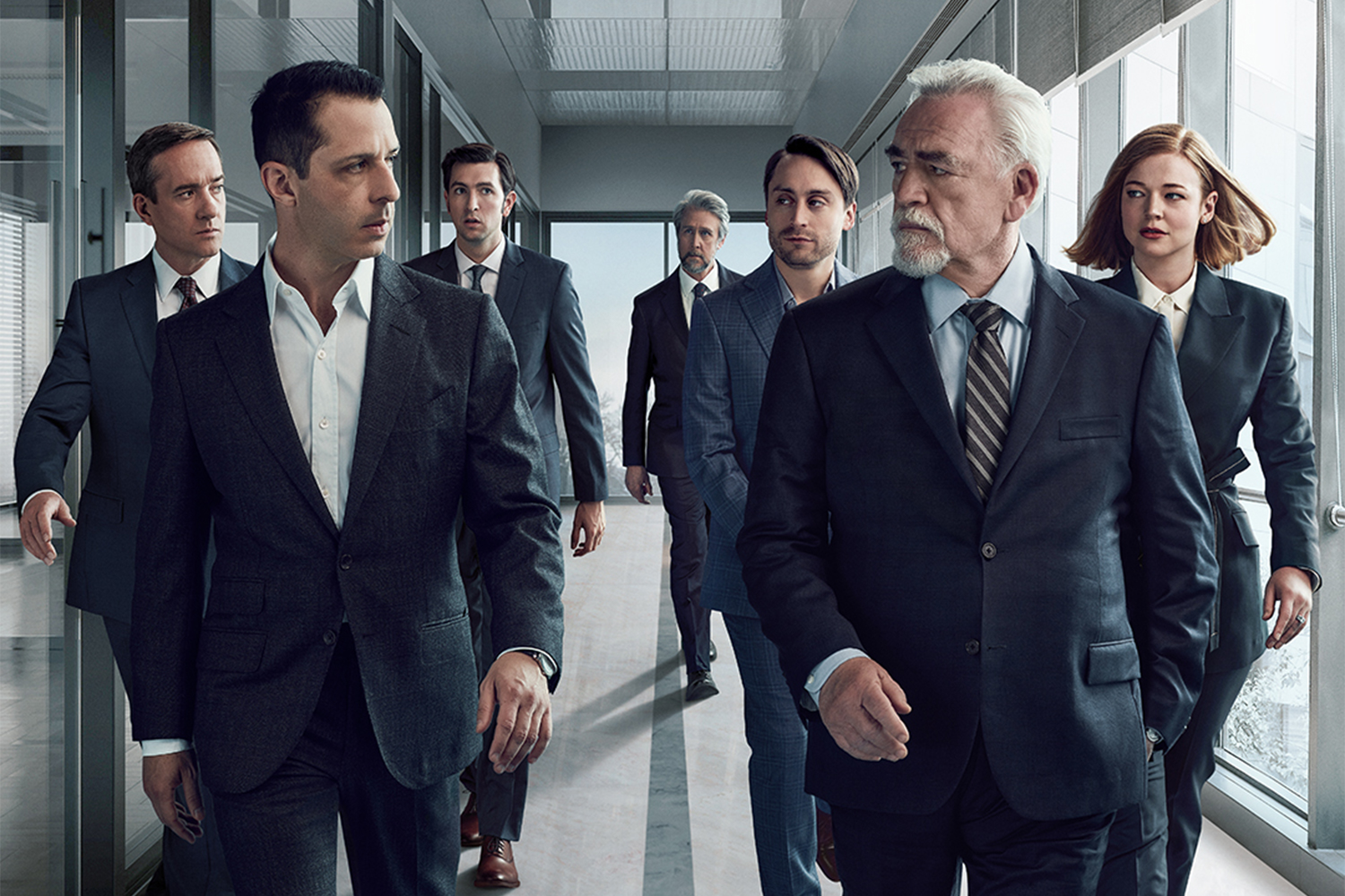 One version of a "Succession" poster for season 3, with the Roy family split up, some behind Kendall, others behind Logan