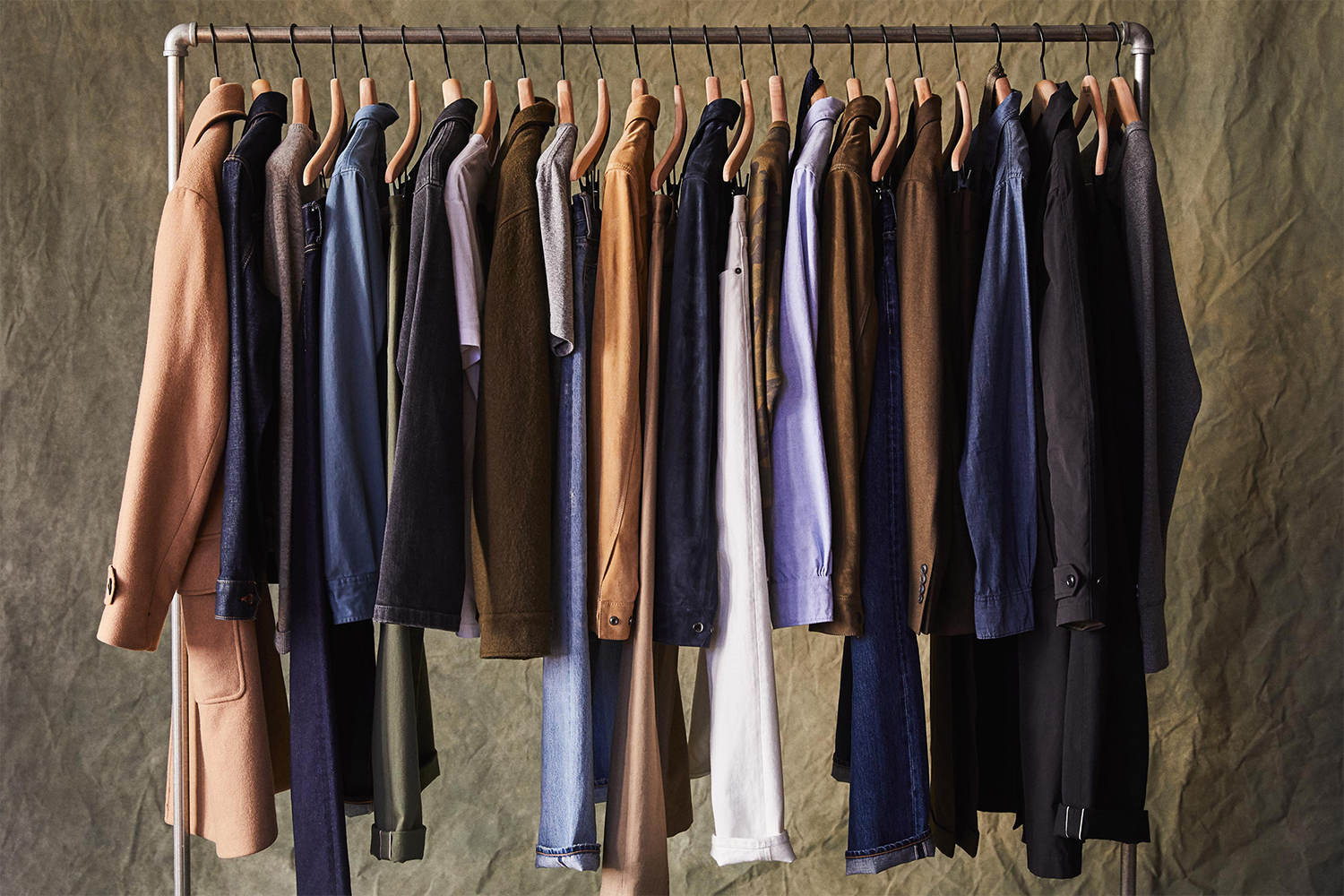 A rack of men's clothes, from pants to shirts to jackets, from Todd Snyder's TSX capsule collection, a 10-year anniversary clothing line