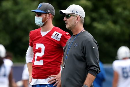 Frank Reich and Carson Wentz of the Indianapolis Colts talk on the field
