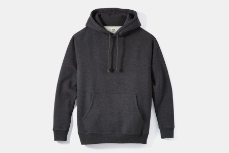 The Speckle Fleece Pullover Hoodie from Flint and Tinder in charcoal grey on a white background