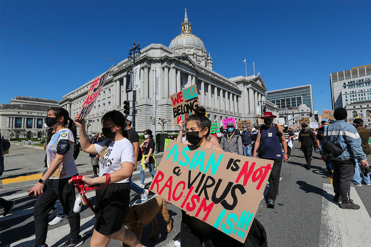 A group of people in San Francisco protesting hate crimes against Asian Americans.
