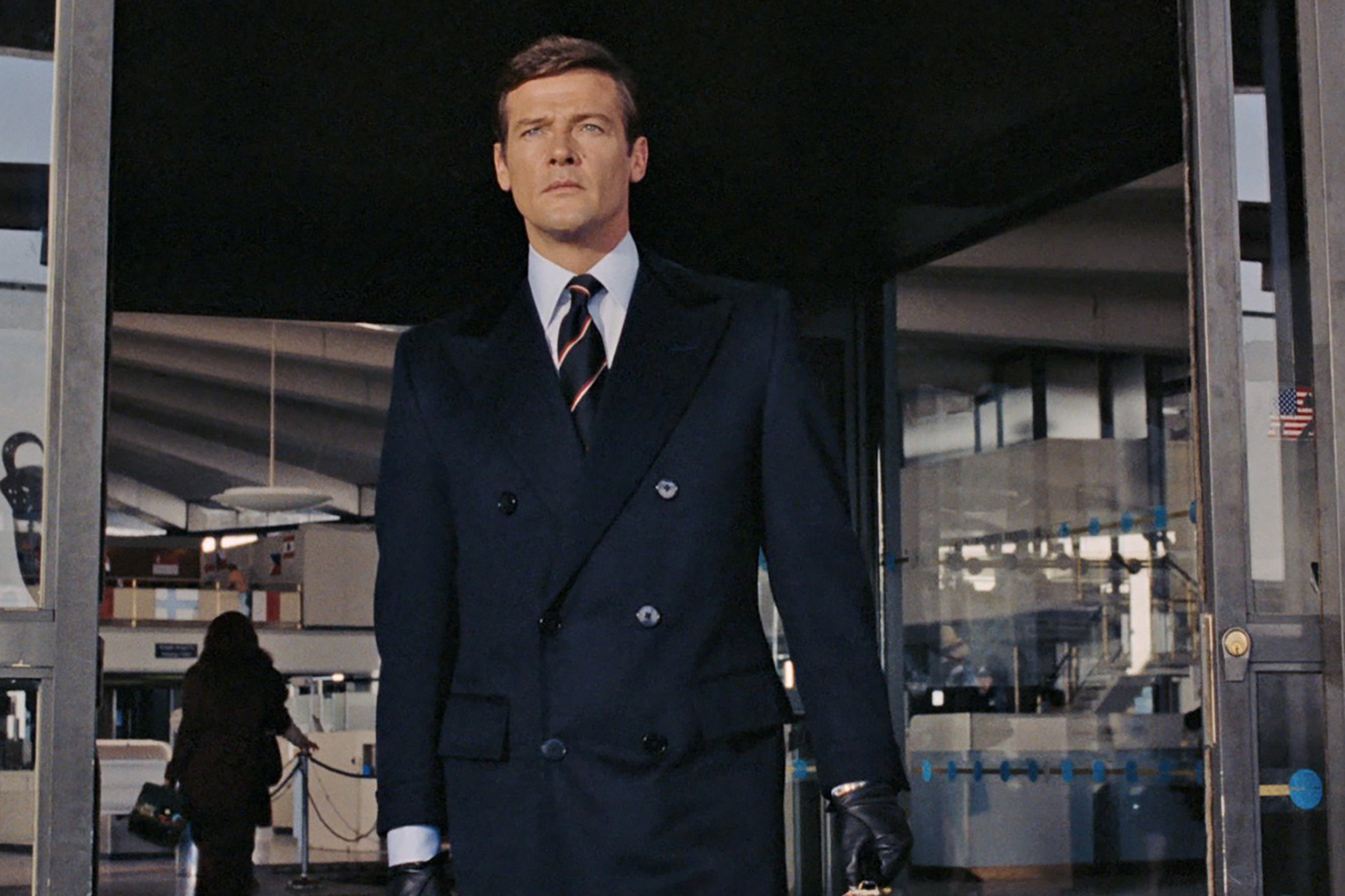 Roger Moore wears a beautiful double breasted jacket in Live and Let Die.