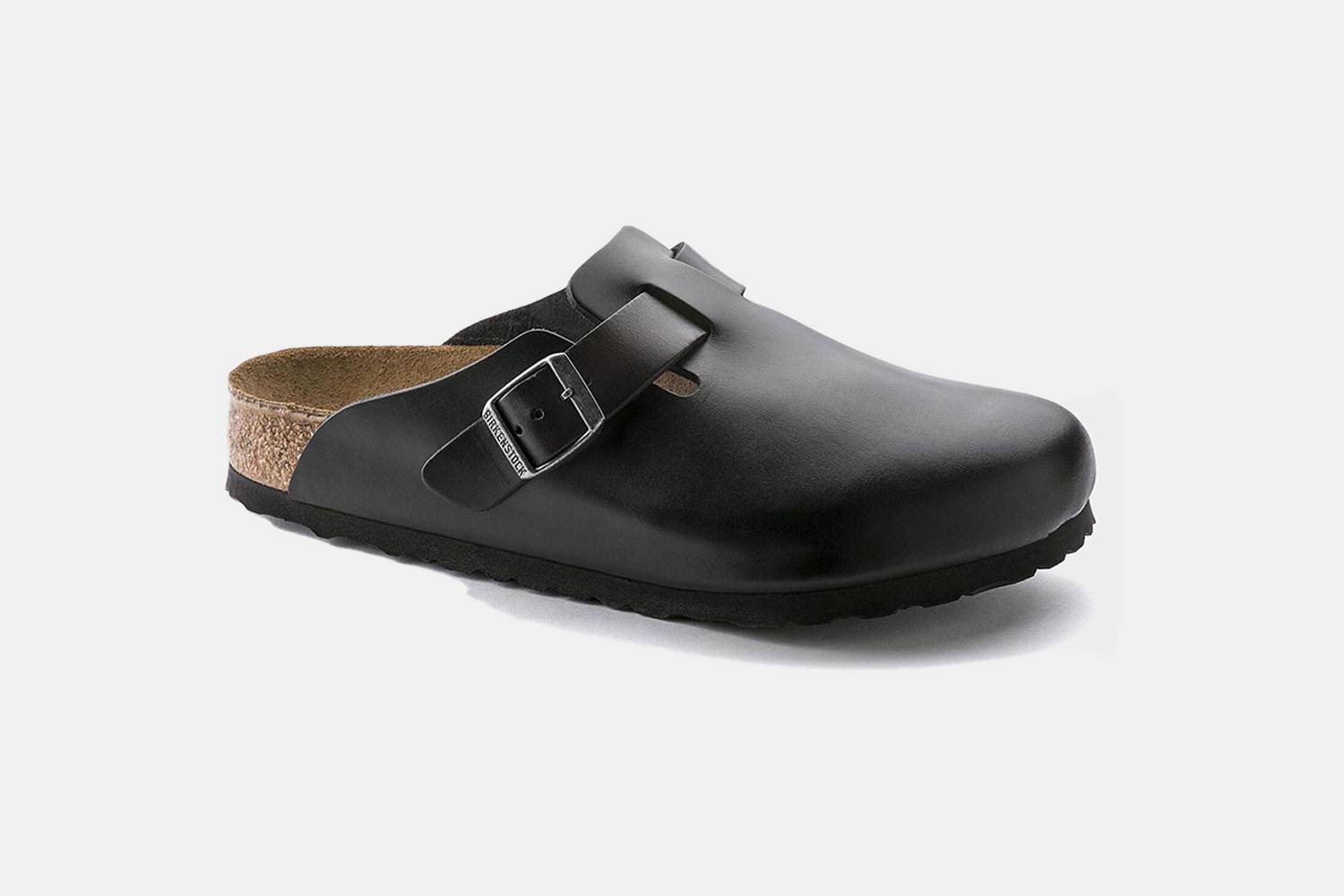 a pair of black leather, clog mules 