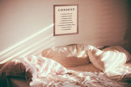 a consent checklist hangs above a bed