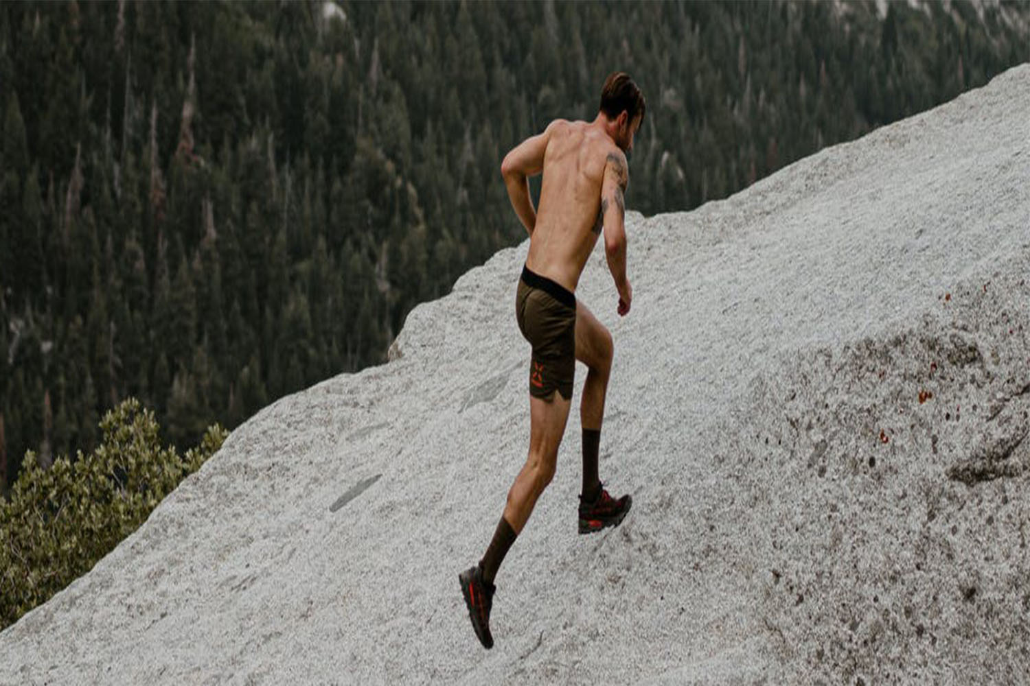 a man running up a mountain
