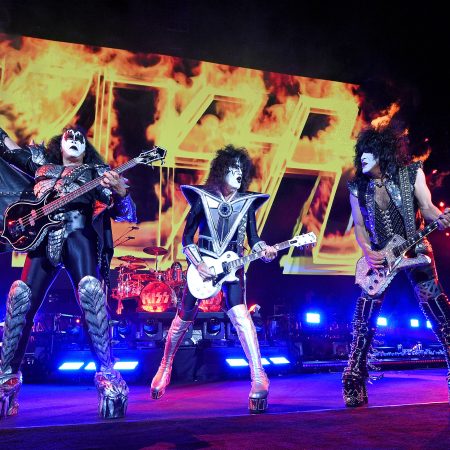 Gene Simmons, Tommy Thayer, and Paul Stanley of KISS perform onstage during the Tribeca Festival screening of "Biography: KISStory" at Battery Park on June 11, 2021 in New York City. A guitar tech for the band recently died of COVID-19, which other roadies are blaming on the band's tour protocols.