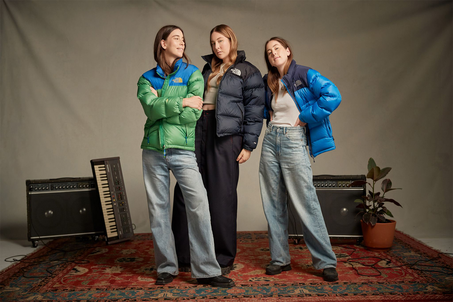 a photo of Haim in The Nort Face jackets 
