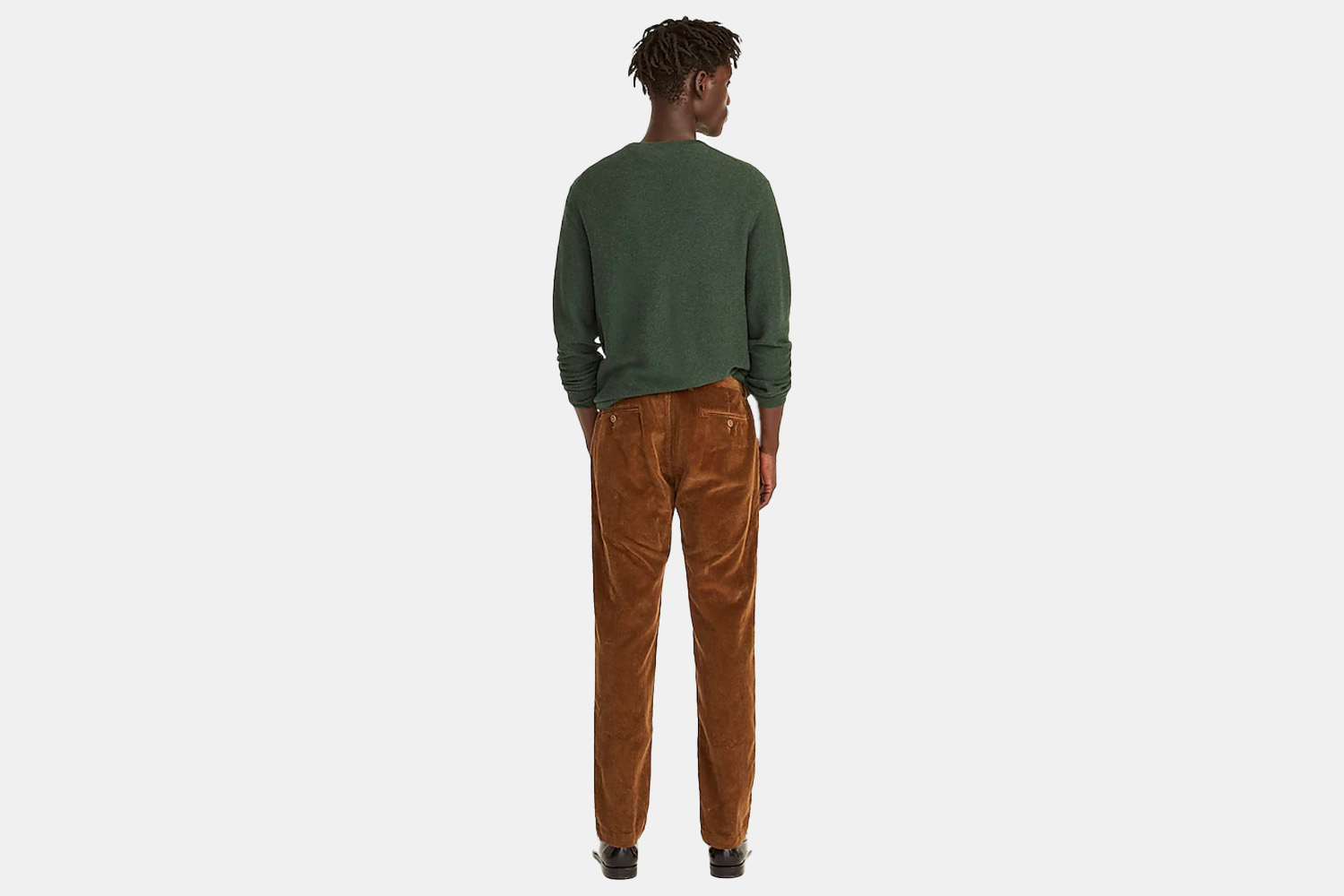 the back view of a pair of pleated corduroy pants