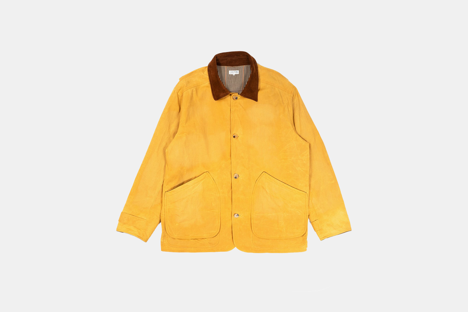 A yellow jacket with corduroy collar