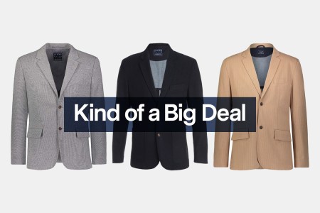 Three different men's blazers from JACHS NY, a grey, black and camel one from left to right, with the words "Kind of a Big Deal" over the top