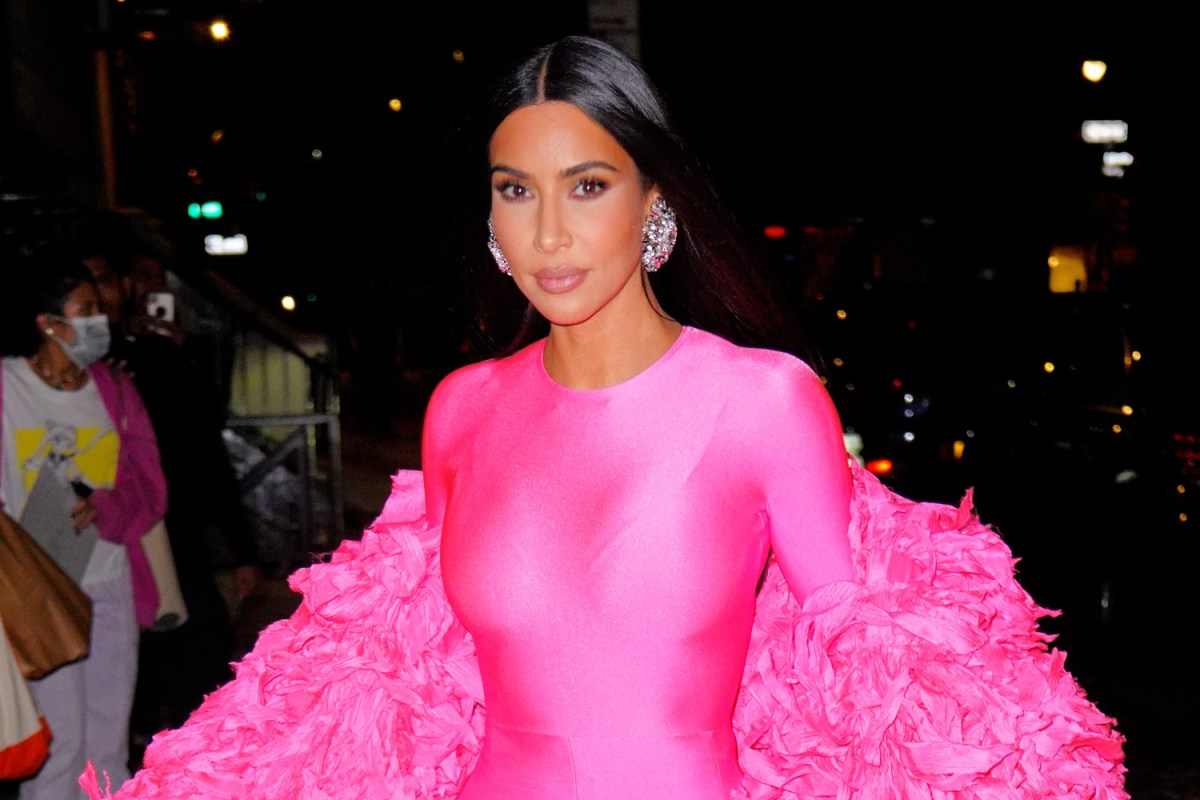 Kim Kardashian wearing a garish pink ensemble