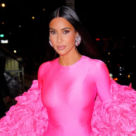 Kim Kardashian wearing a garish pink ensemble