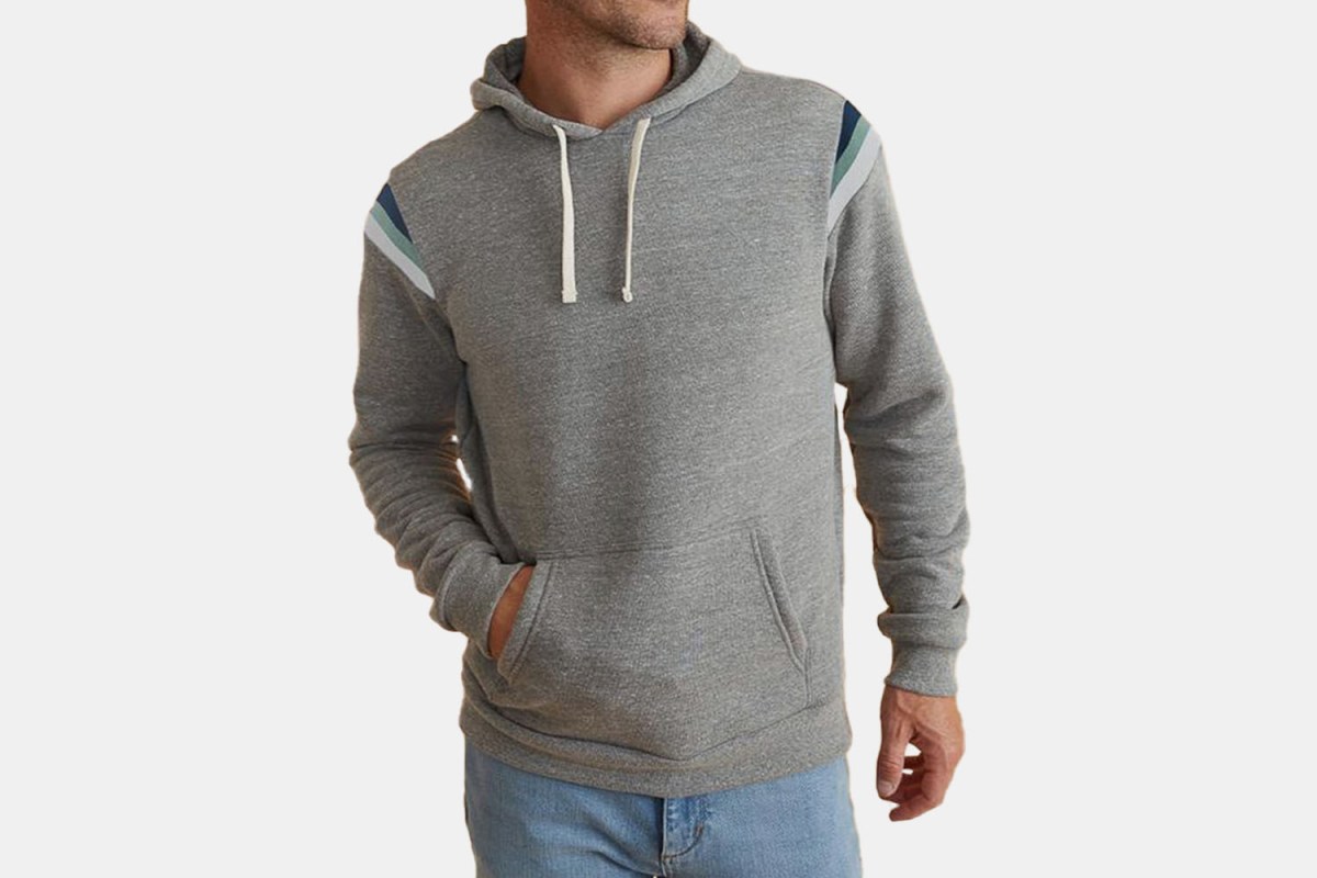 a grey hoodie on a model