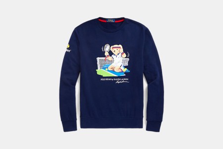 a blue crewneck fleece sweater with classic Polo Bear Iconography