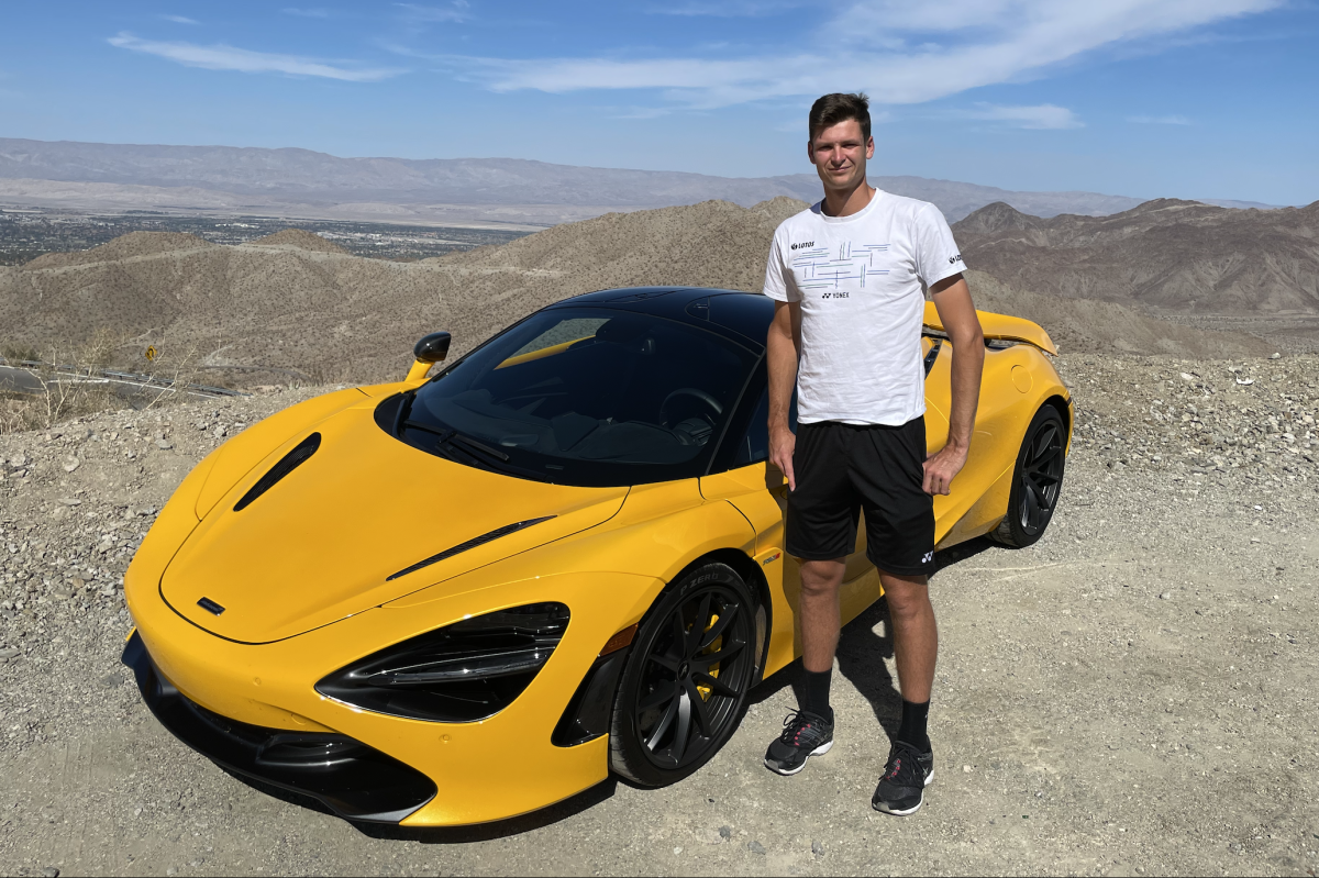 Polish tennis star Hubert “Hubi” Hurkacz poses with a McLaren