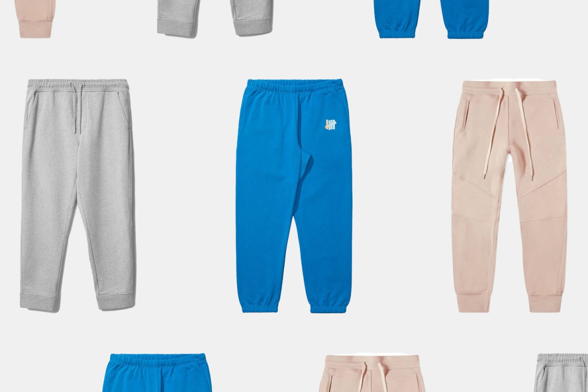 Grey sweatpants from Everlane, blue sweatpants from Undefeated and pink sweats from John Elliott, arranged in three rows on a grey background