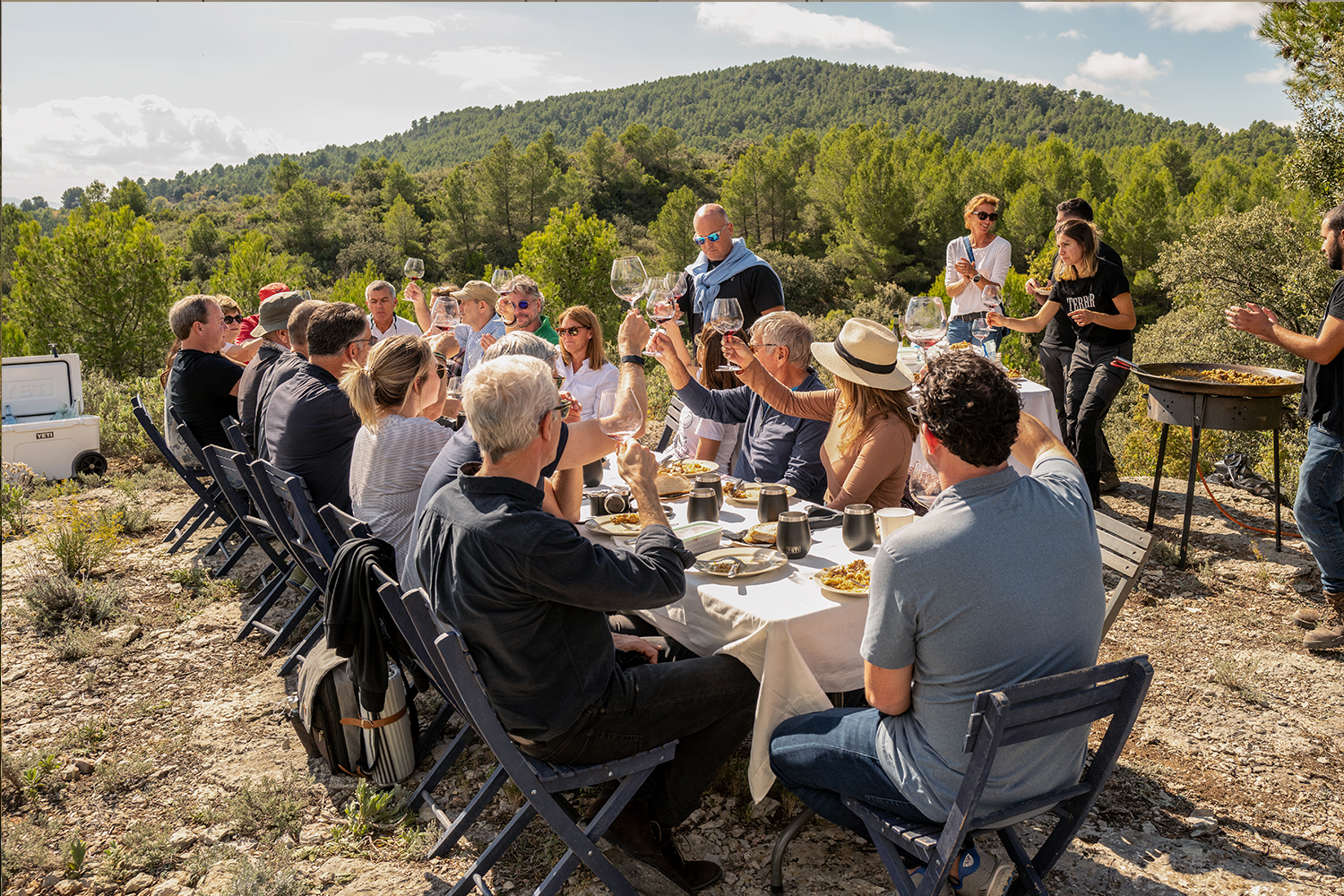 A toast over a paella lunch in Terroir Al Límit's highest altitude vineyard