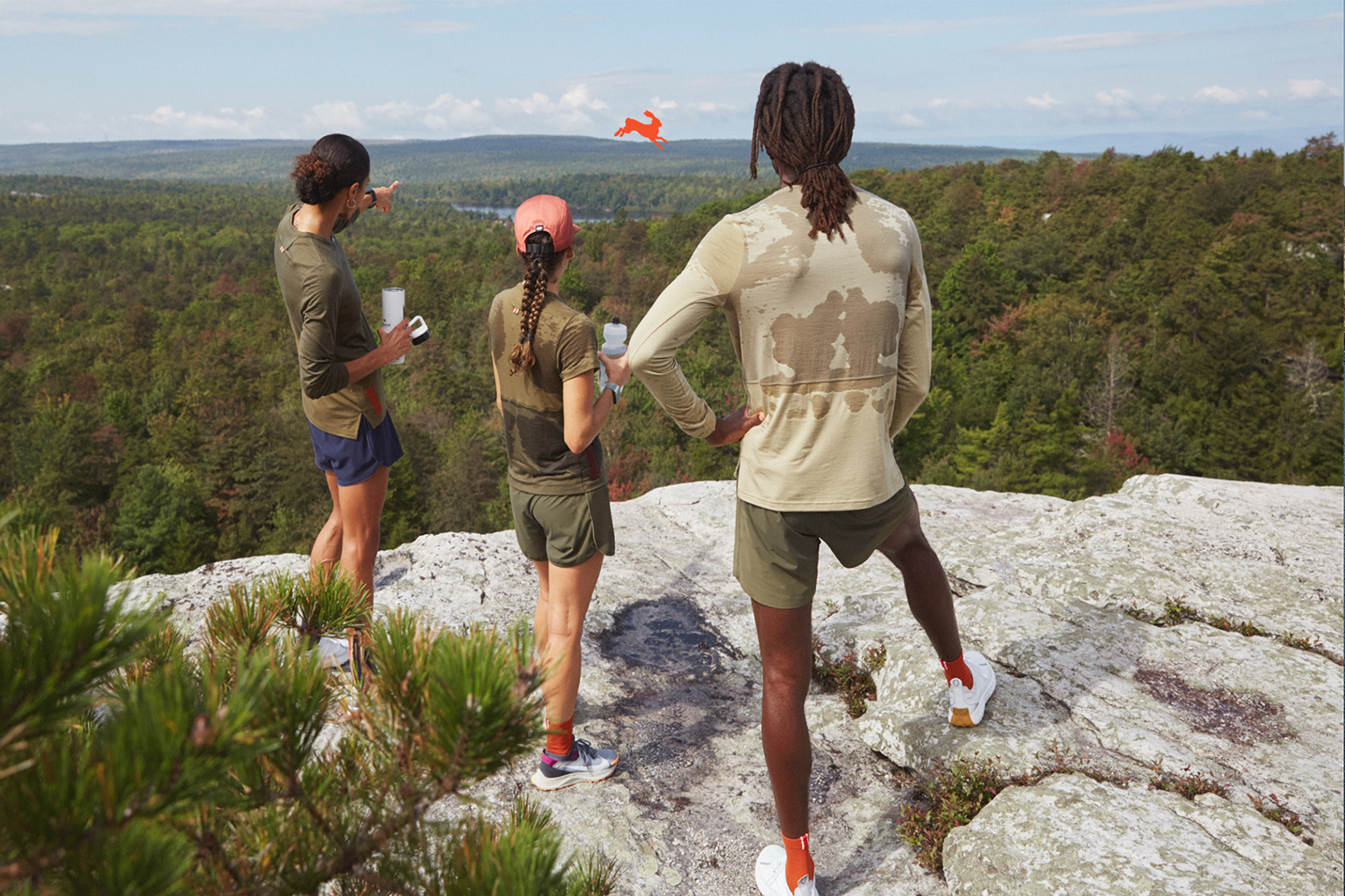 a photo of runners on a mountain