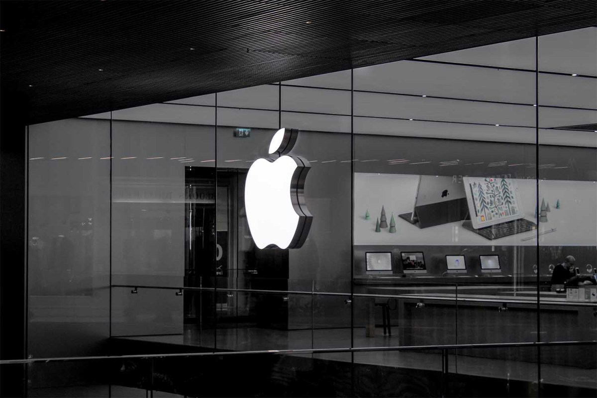 A black and white photo of an Apple store.