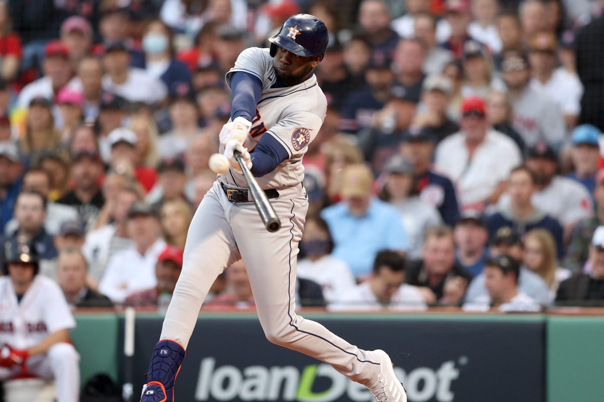 Yordan Alvarez of the Houston Astros hits a home run against the Boston Red Sox