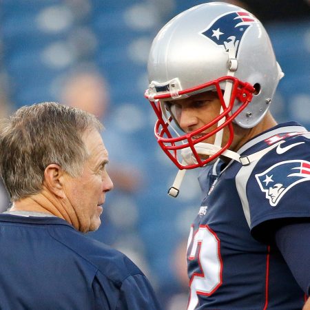 Bill Belichick and Tom Brady chat before a preseason game in 2017