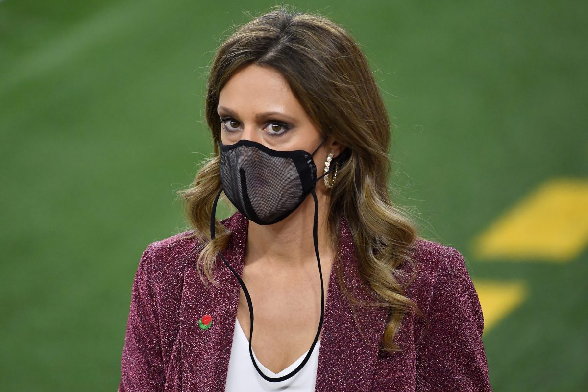 Sideline reporter Allison Williams wearing a face mask during the College Football Playoff Semifinal in 2021