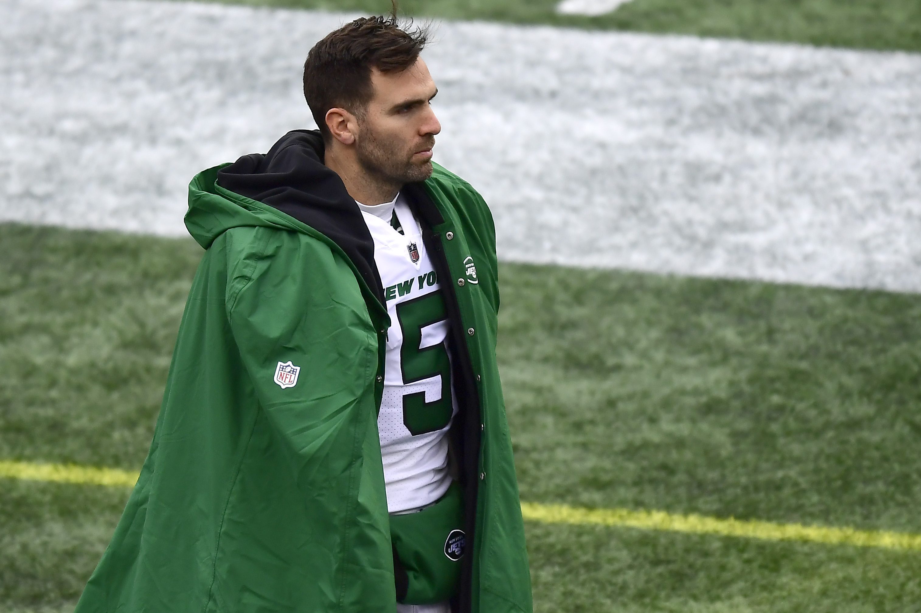 Joe Flacco looks on during a game against the New England Patriots