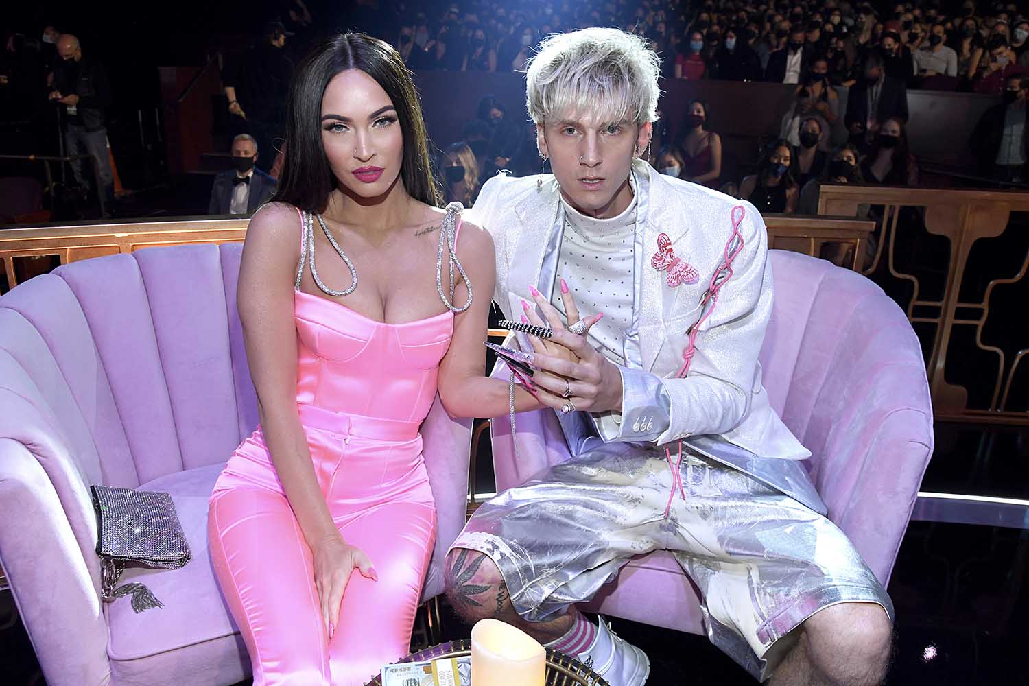 Megan Fox and Machine Gun Kelly attend the 2021 iHeartRadio Music Awards at The Dolby Theatre in Los Angeles, California, which was broadcast live on FOX on May 27, 2021.