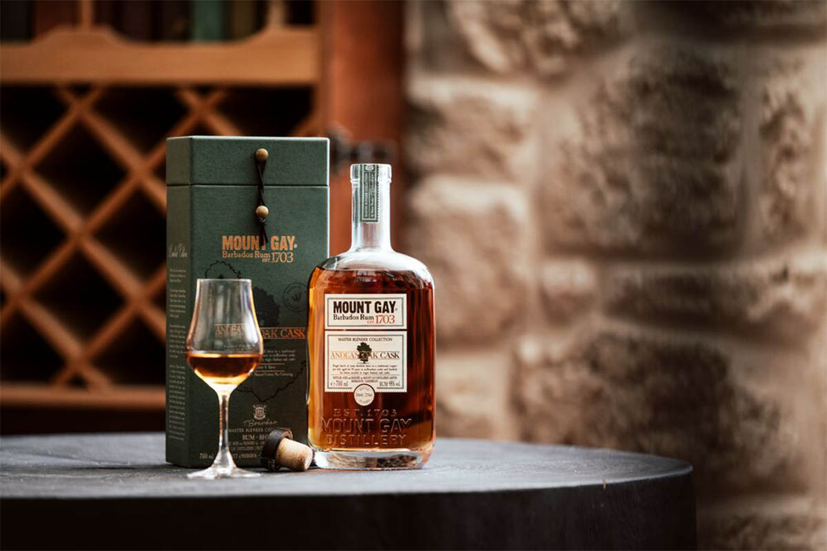 Mount Gay Master Blender Collection Andean Oak Cask, with a glass of rum. The rum is new and limited edition.
