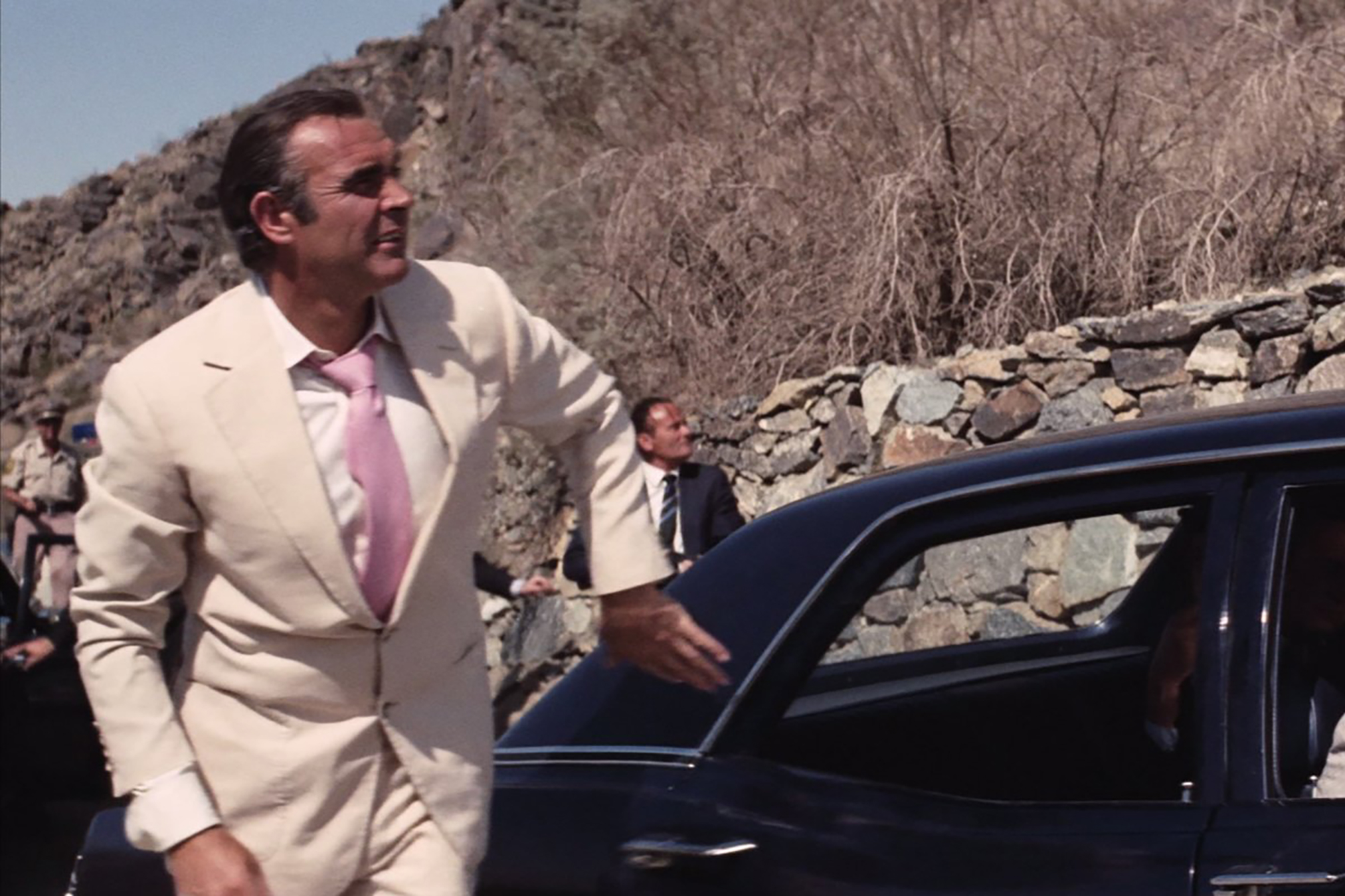 Sean Connery rocks a tan suit in Diamonds are Forever.