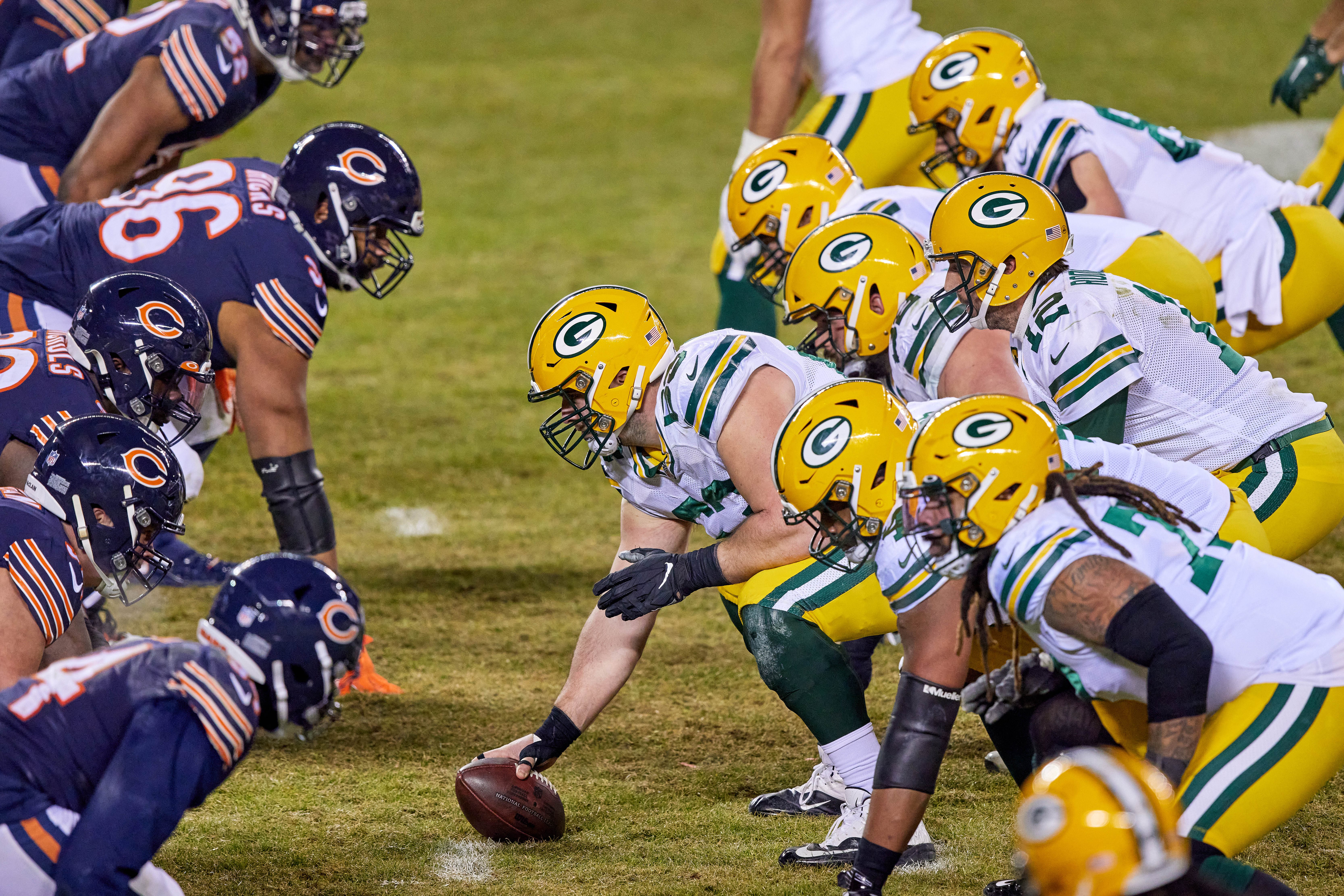 Aaron Rodgers gets ready to snap the ball
