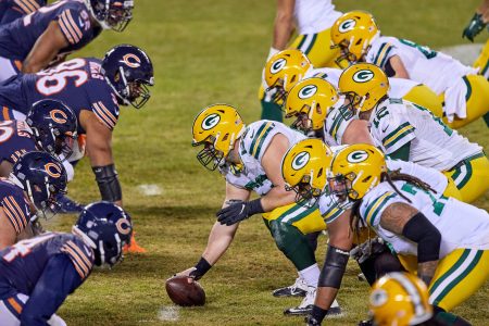 Aaron Rodgers gets ready to snap the ball