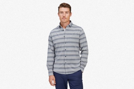 A grey stripe performance flannel from Mizzen + Main worn by a man. The shirts are on sale in October 2021.