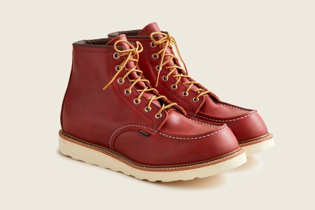 Red Wing Classic Moc-Toe Boots in Oro Russet Leather With a Gore-Tex Lining on a cream background. These shoes are currently on sale at J.Crew.