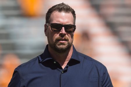 Ex-QB Ryan Leaf walking off the field before a college football game