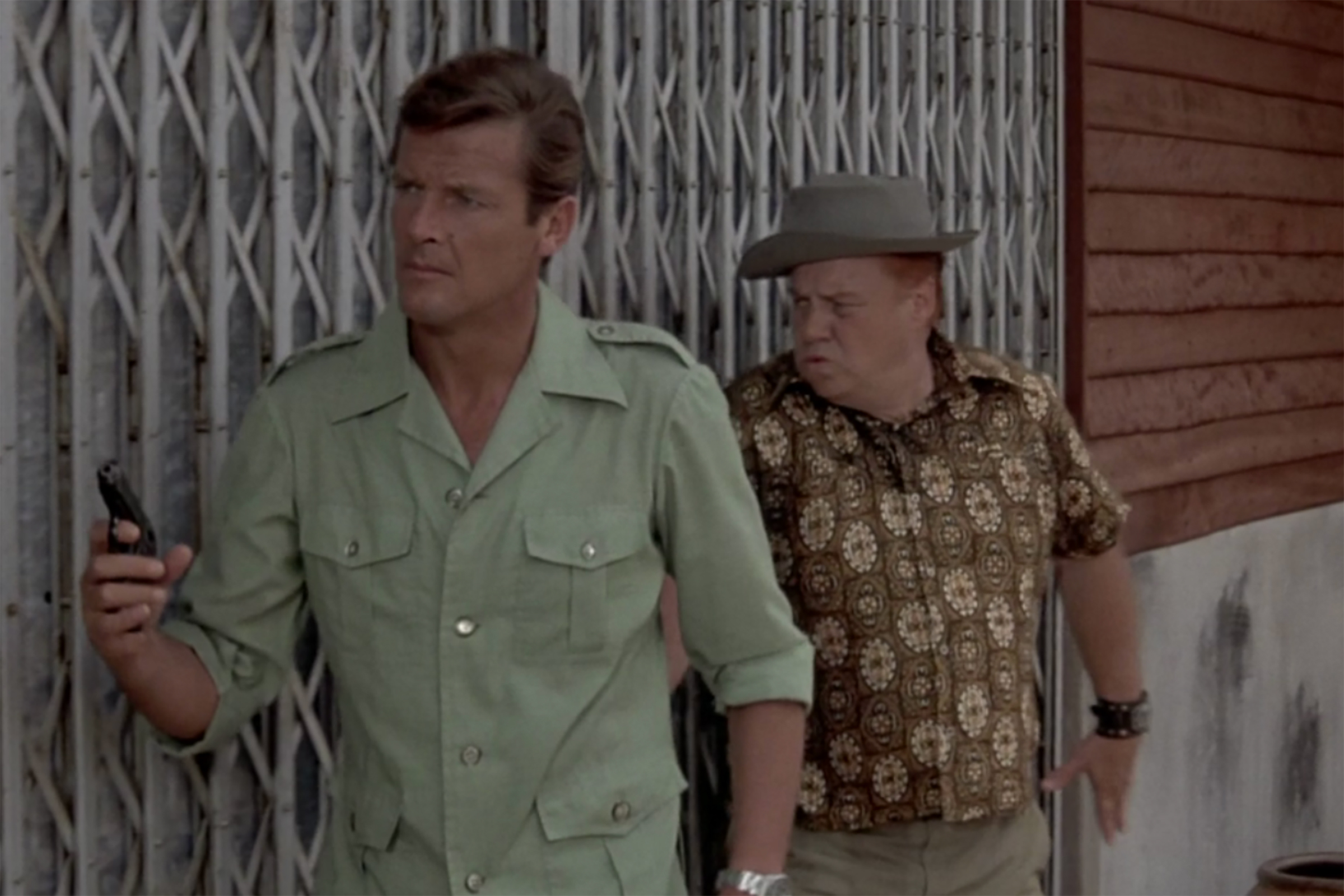 In Man with the Golden Gun, Moore wears a safari jacket, made by Hong Kong tailor Jimmy Chen.