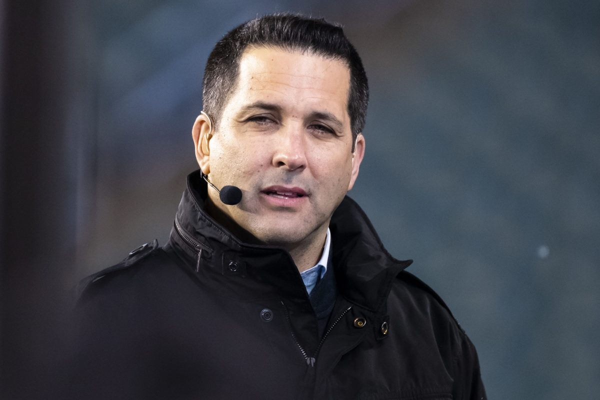 ESPN analyst Adam Schefter at Lincoln Financial Field in 2019. The ESPN reporter is under fire for leaked emails that suggest he got editorial assistance from an NFL owner.