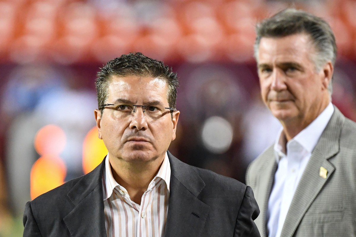 WFT owner Dan Snyder paces the sidelines in front of former general manager Bruce Allen at a game against the Chicago Bears in 2019
