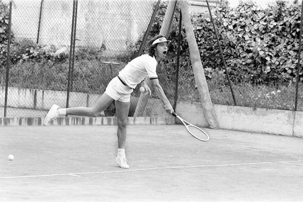 Mick Jagger playing tennis.
