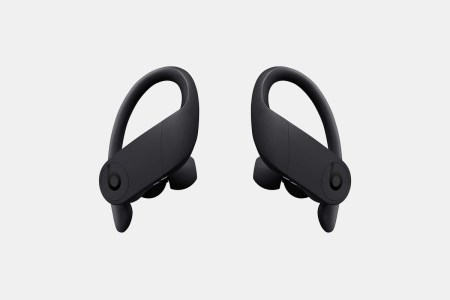 powerbeats pros against a grey background