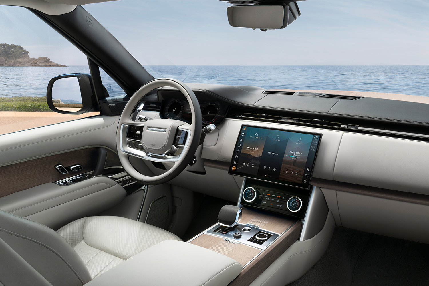 The interior of the new 2022 Range Rover, the fifth generation of the luxury SUV, showing the new tablet infotainment
