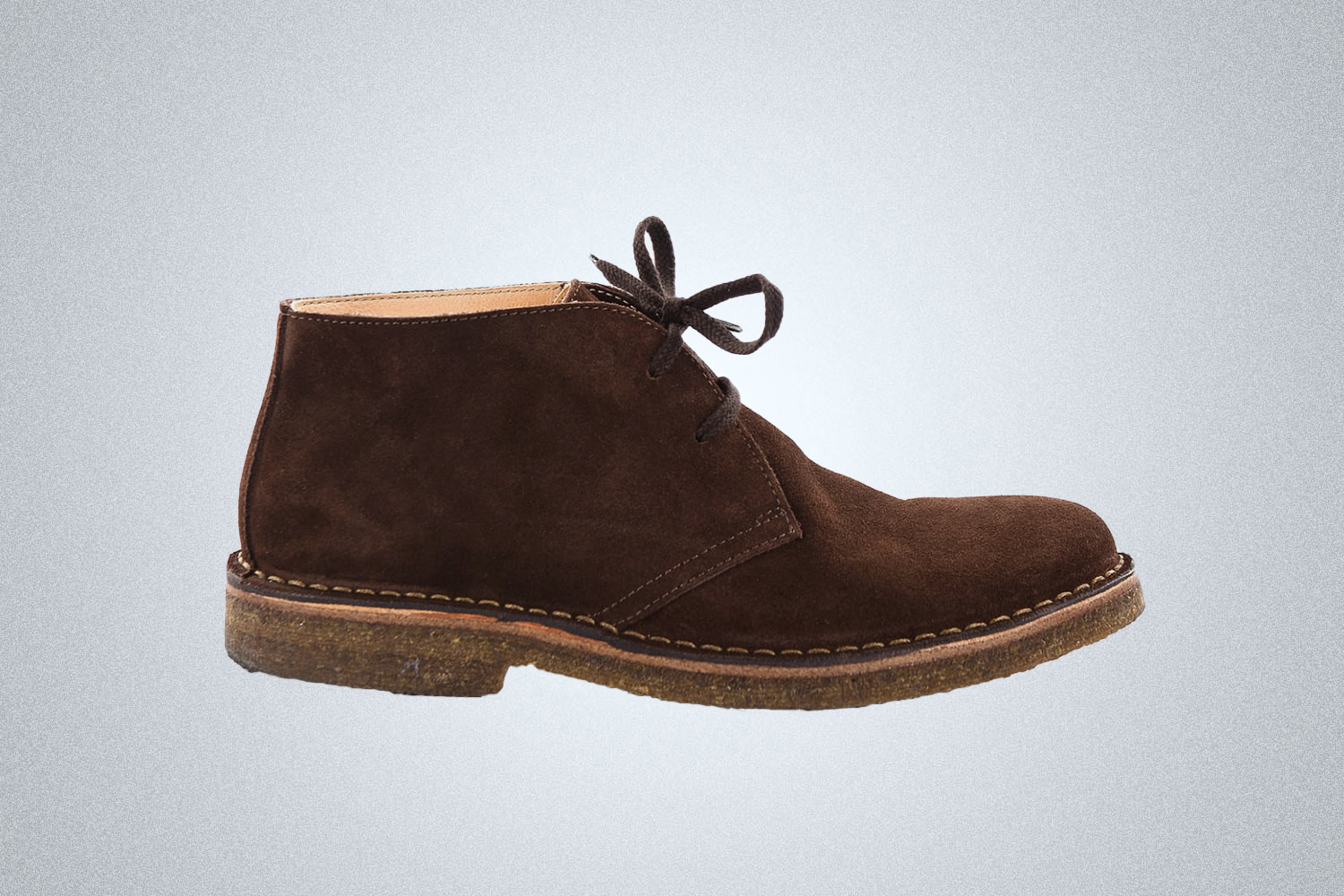a brown leather chukka boot